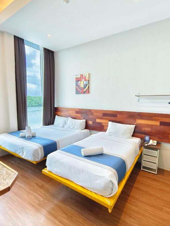 The Riverbank Hotel By MRVJ Business - Suite Familiar