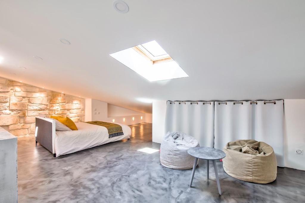 Posteľ alebo postele v izbe v ubytovaní Artistic Loft Travel Experience