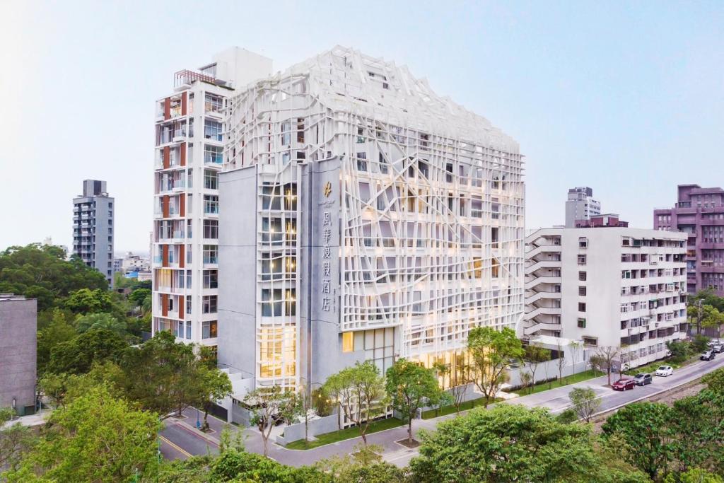 a rendering of a white building in a city at Orient Luxury Hotel-Jiaoxi in Jiaoxi