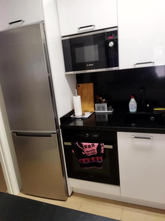 Kuchyň nebo kuchyňský kout v ubytování Garrucha Pinar con sorpresa