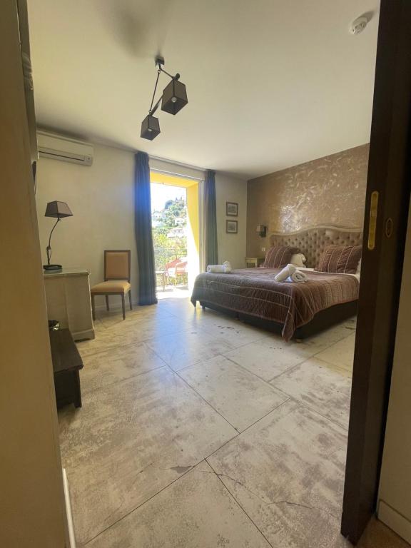 Postel nebo postele na pokoji v ubytování Hôtel de La Fossette
