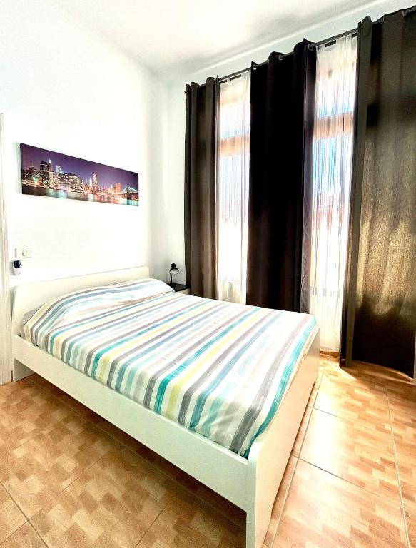 Postel nebo postele na pokoji v ubytování Apartments Las Brisas Costa Adeje