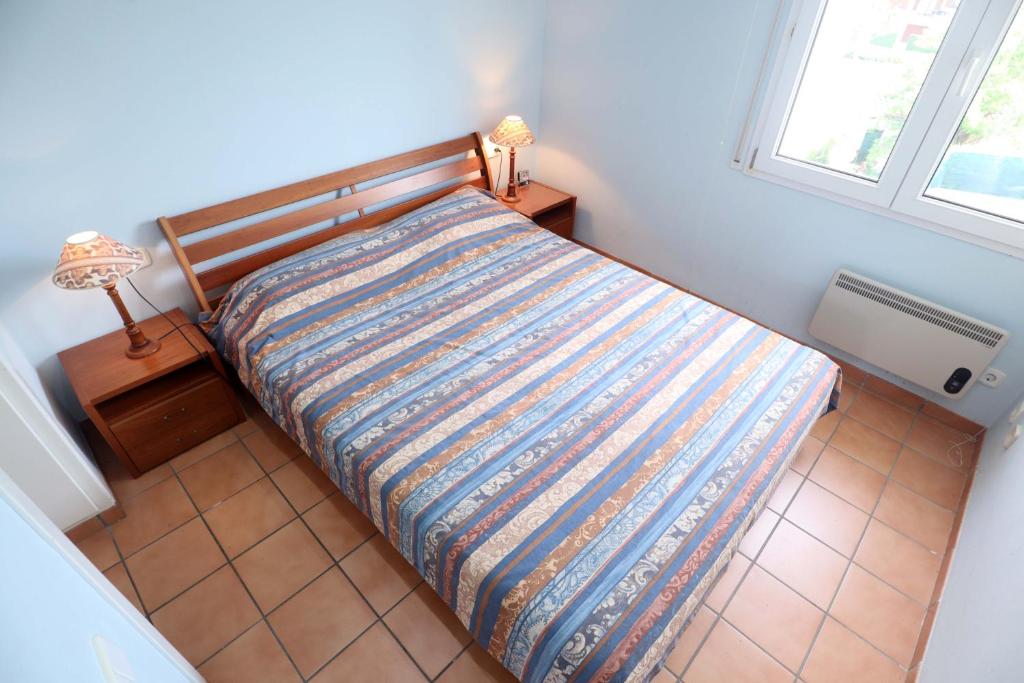 Posteľ alebo postele v izbe v ubytovaní Amplio Apartamento Bahia II