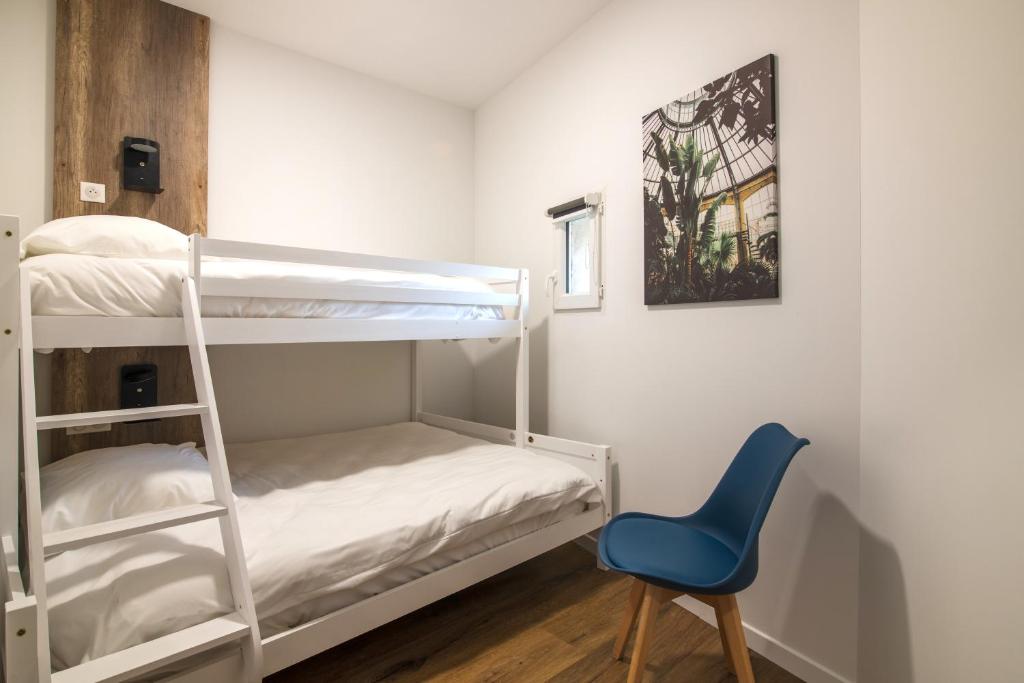 Postel nebo postele na pokoji v ubytování O'Cub Hotel