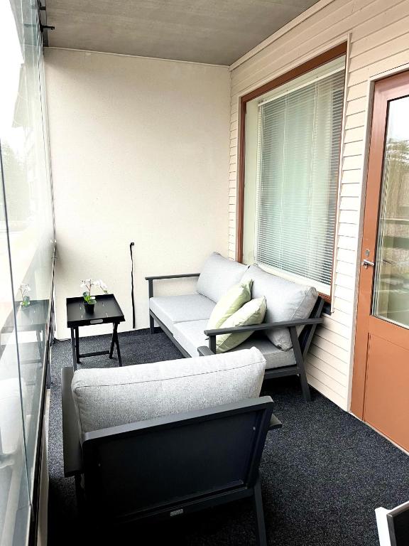 Posezení v ubytování Premium Chalet 4212 Green