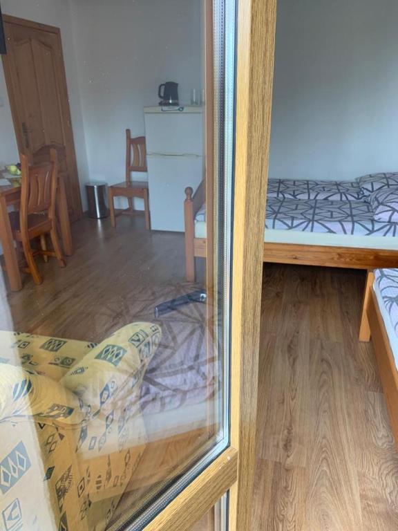 Postel nebo postele na pokoji v ubytování Willa Kaszub