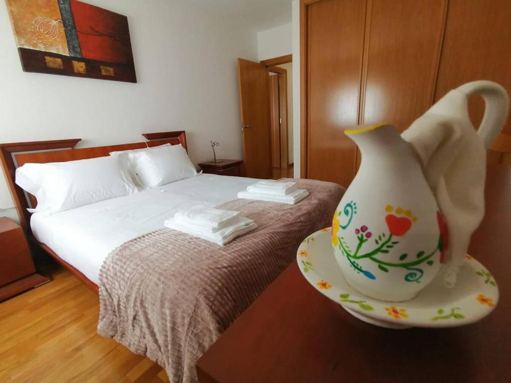 Postel nebo postele na pokoji v ubytování Apartamentos Vila Verde