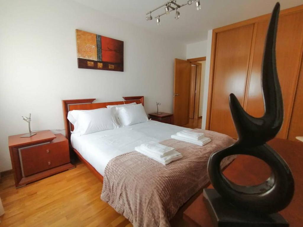 Postel nebo postele na pokoji v ubytování Apartamentos Vila Verde