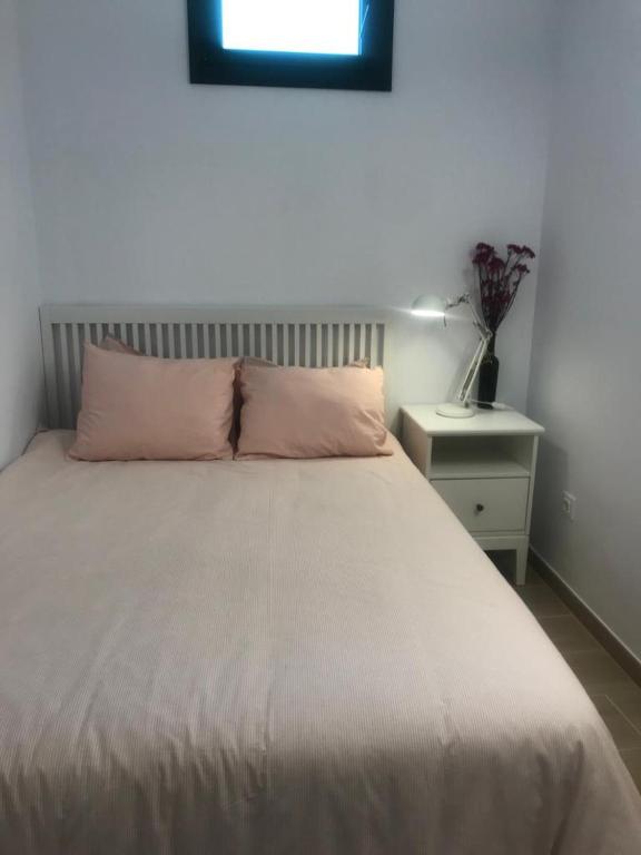 Postel nebo postele na pokoji v ubytování Encantadora casa rural Can Vidal
