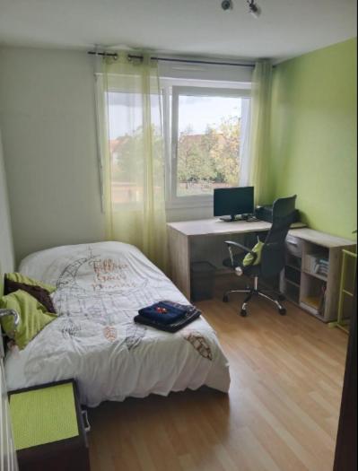 Postel nebo postele na pokoji v ubytování Chambre #3 dans appartement partagé - Proche des Vosges