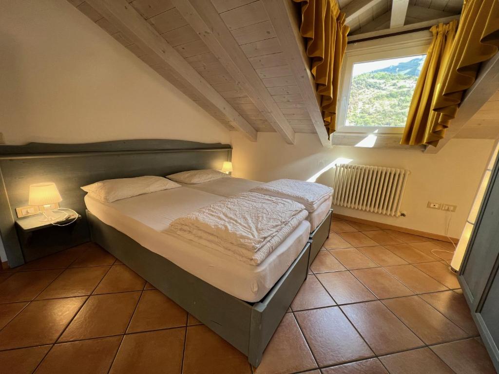 Posteľ alebo postele v izbe v ubytovaní Studio Apartments Baia Azzurra 7