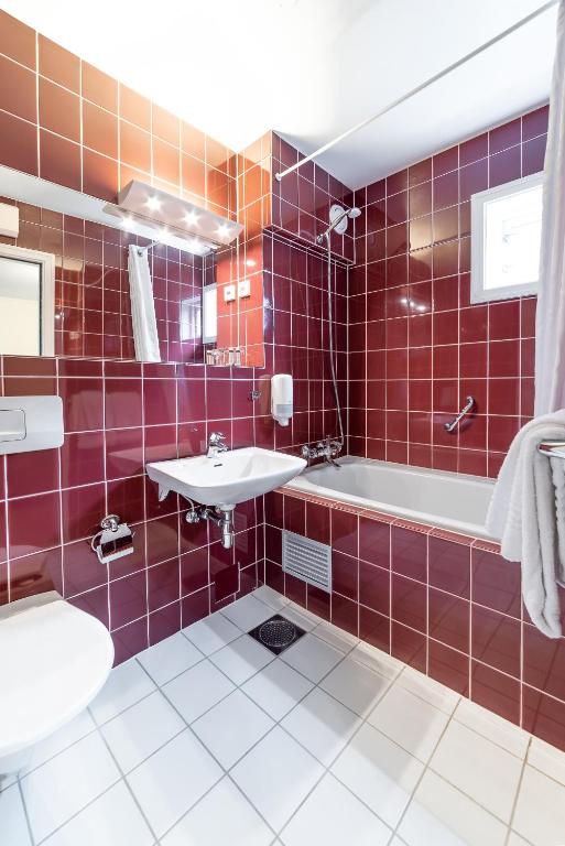 Koupelna v ubytování Kronen Gaard Hotel