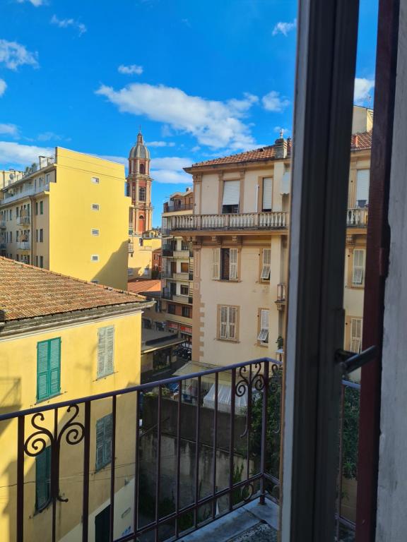 a view of the city from a balcony at Verde Monte Di Portofino by PortofinoVacanze in Rapallo