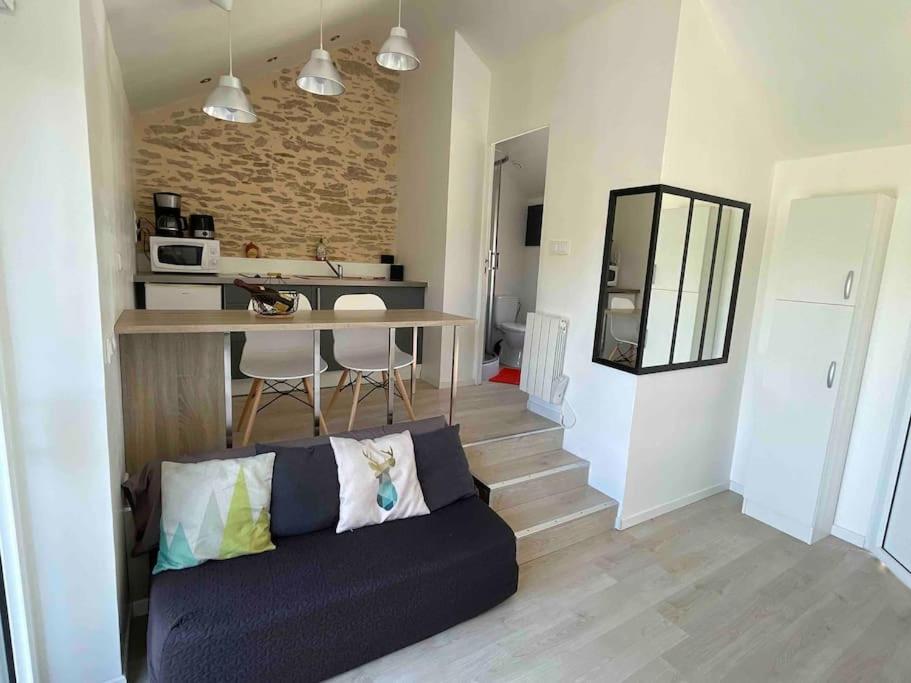Kuchyňa alebo kuchynka v ubytovaní Appartement avec Jardin
