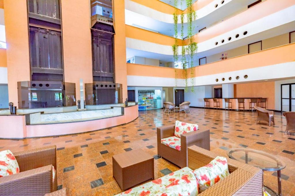 Uma área de estar em Maria Leuça Teixeira Duarte - AYAMBRA RESIDENCIAL HOTEL Avenida Vinte e Cinco de Dezembro, 525 Praia do Meio Natal RN