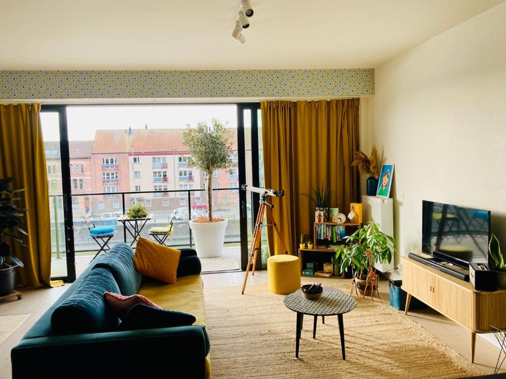 Area tempat duduk di Cozy two bedroom Apartment near city centre Gent