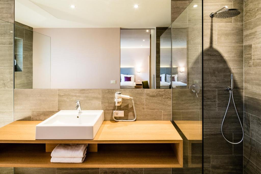 Koupelna v ubytování Hotel Jardis