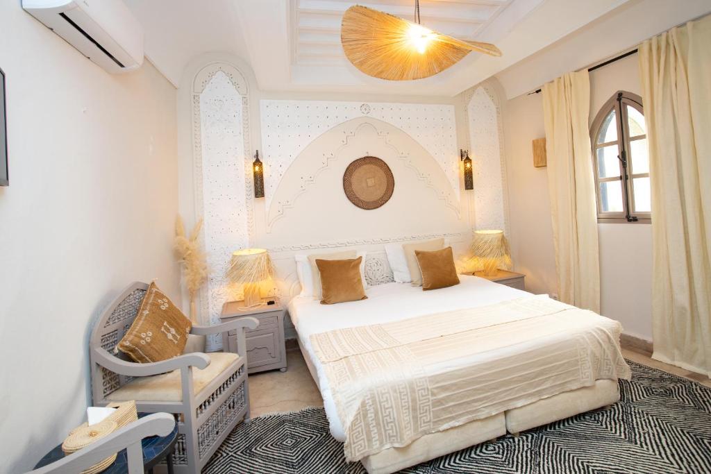Postel nebo postele na pokoji v ubytování Riad Jonan & Spa