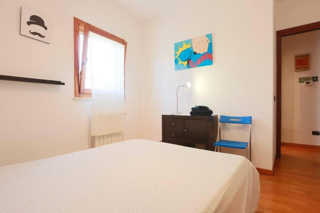 Postel nebo postele na pokoji v ubytování Quercegrossa 10