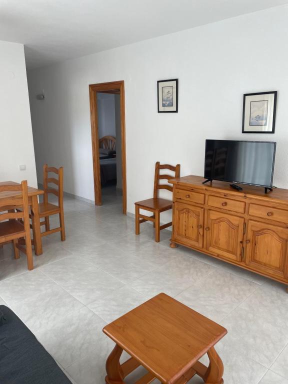 Televízia a/alebo spoločenská miestnosť v ubytovaní CN Rents