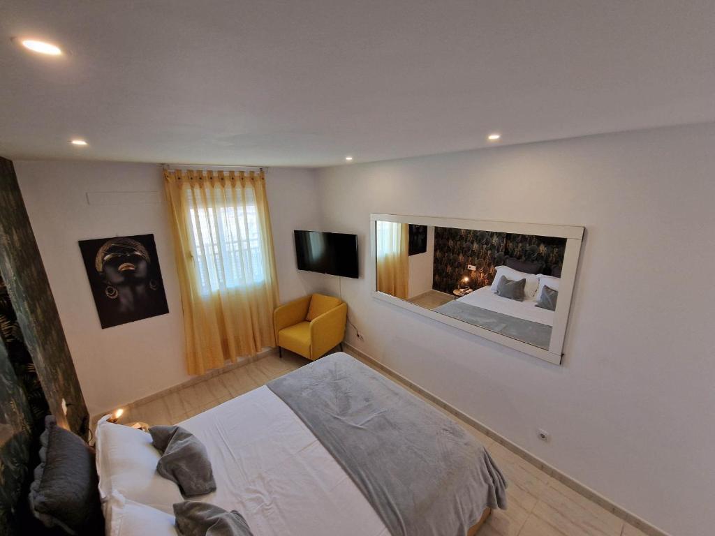 Postel nebo postele na pokoji v ubytování Sea Point Holiday House