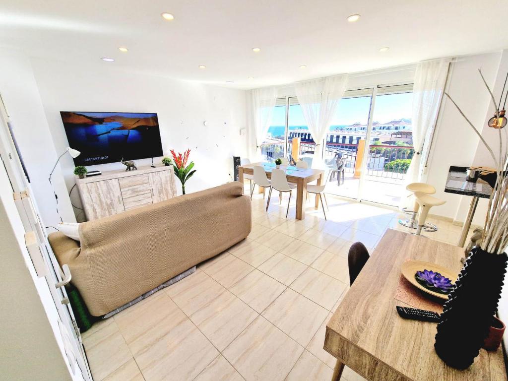 TV a/nebo společenská místnost v ubytování Sea Point Holiday House