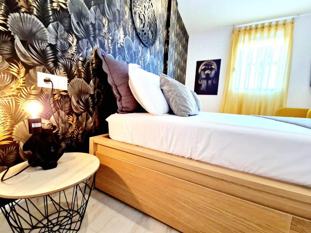 Postel nebo postele na pokoji v ubytování Sea Point Holiday House