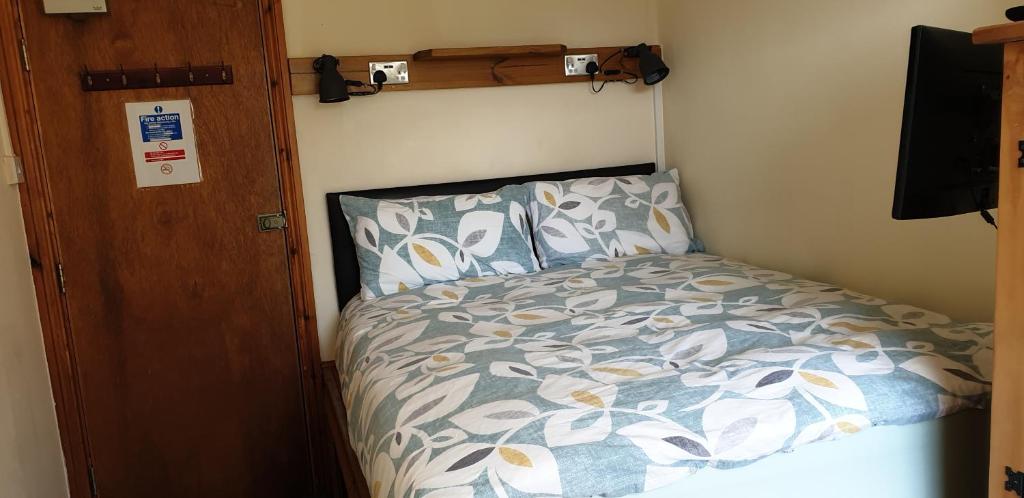 Cama o camas de una habitación en Barmy Badger Backpackers