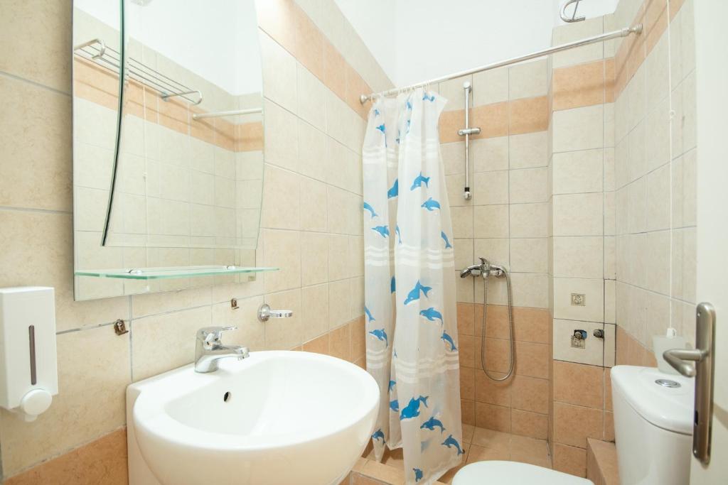 Koupelna v ubytování Marco Polo Hotel