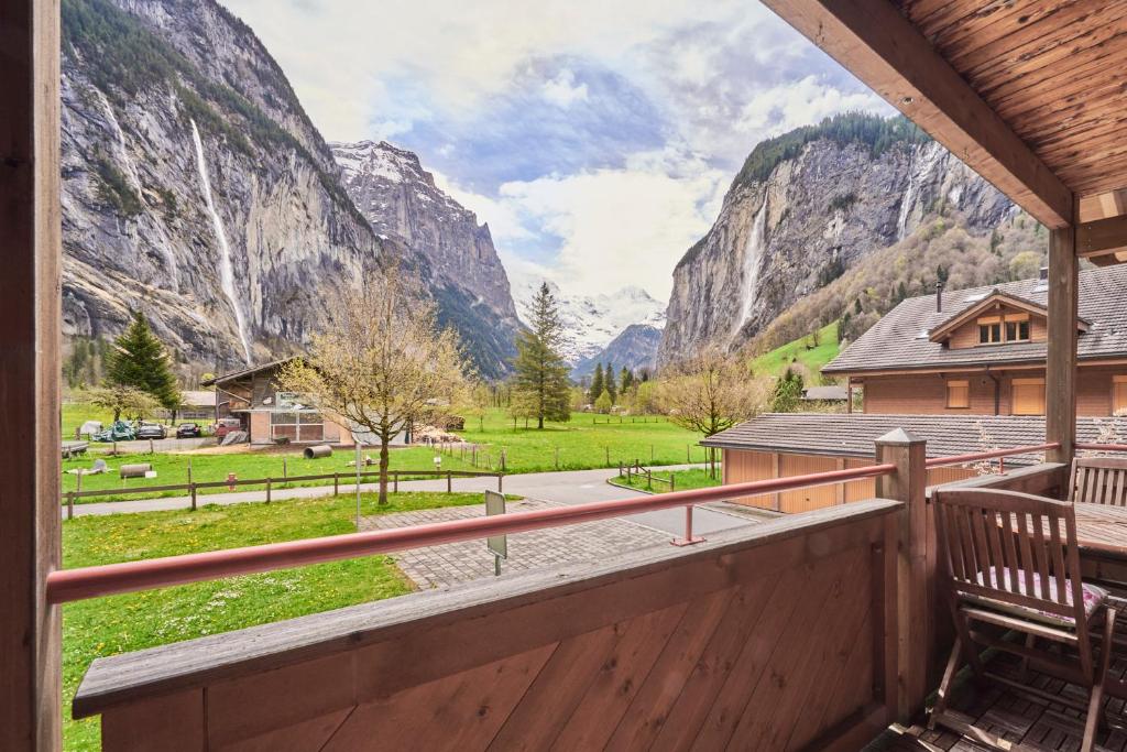 a balcony with a view of the mountains at Apartment Mountain View, Luxury, Spacious with best Views in Lauterbrunnen