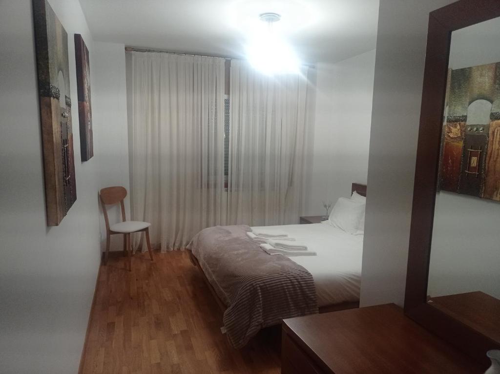 Postel nebo postele na pokoji v ubytování Apartamentos Vila Verde