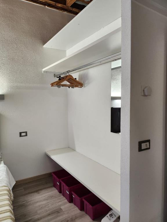 Posteľ alebo postele v izbe v ubytovaní Mansarde & Suite Maison 1706 Lago Orta