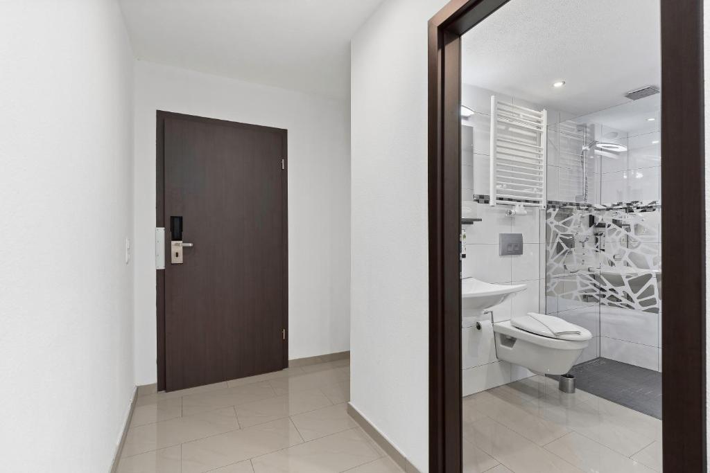 Koupelna v ubytování Hotel Adler