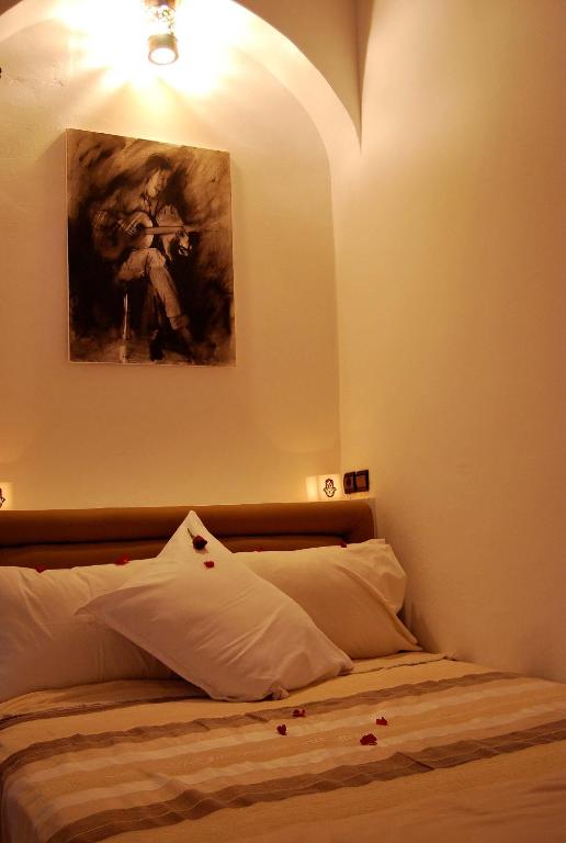 Postel nebo postele na pokoji v ubytování Hotel Riad Todos