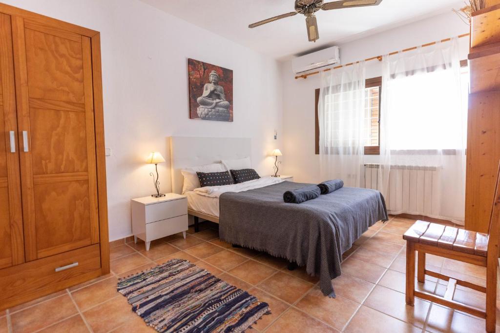 Postel nebo postele na pokoji v ubytování Villa Miguel