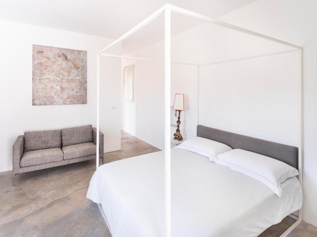 Postel nebo postele na pokoji v ubytování Masseria Alchimia