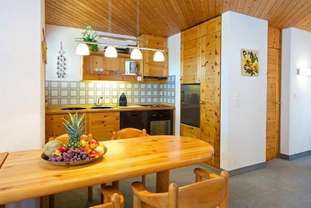 Kuchyň nebo kuchyňský kout v ubytování Apartment Schweizerhof 242 Lenzerheide