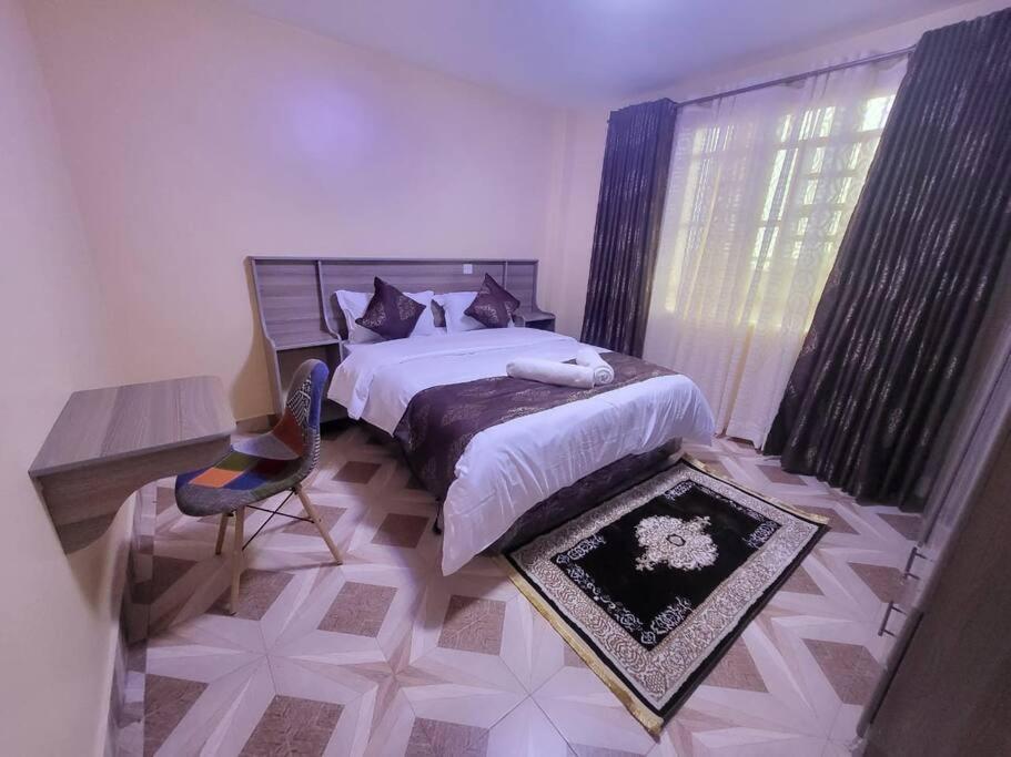 Ένα ή περισσότερα κρεβάτια σε δωμάτιο στο Amazon House 2 Bedroom House