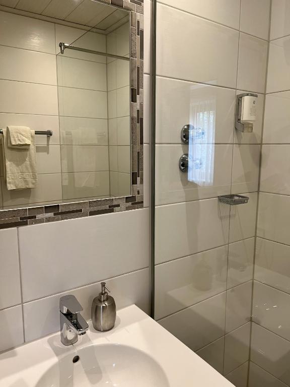 Koupelna v ubytování Hotel Garni Illertal