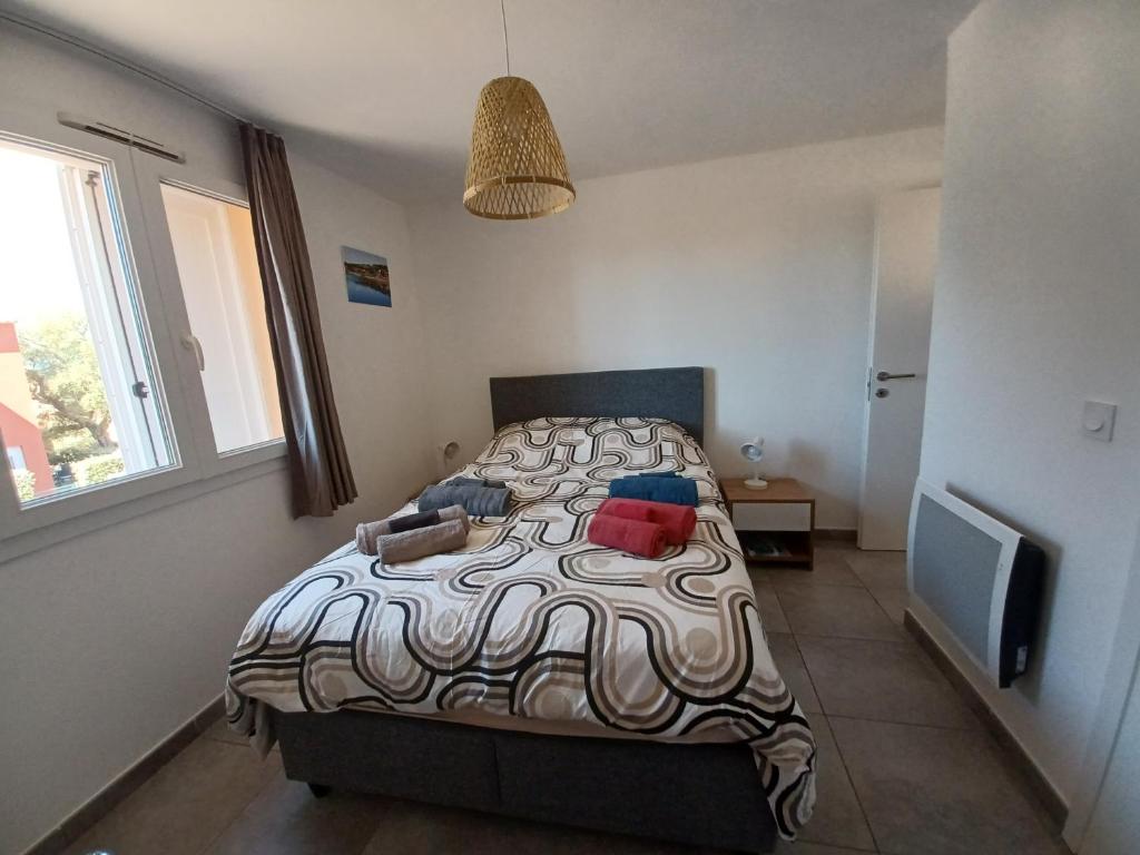 Posteľ alebo postele v izbe v ubytovaní Apt 91, T2 à LECCI avec piscines, proche plage