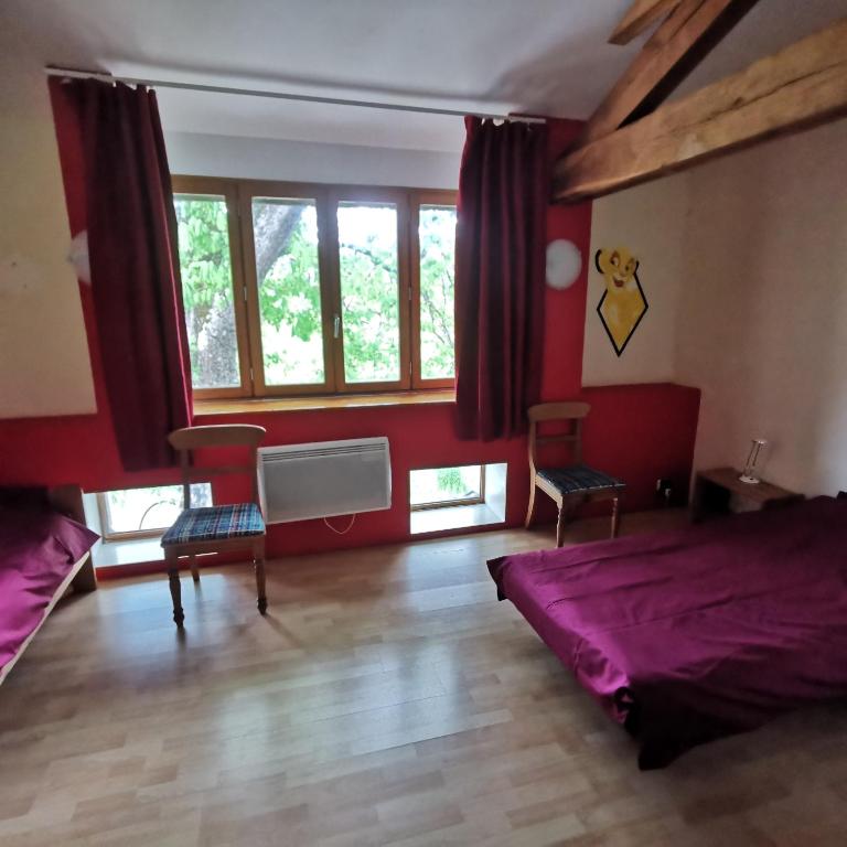 Postel nebo postele na pokoji v ubytování Auberge du Précontent