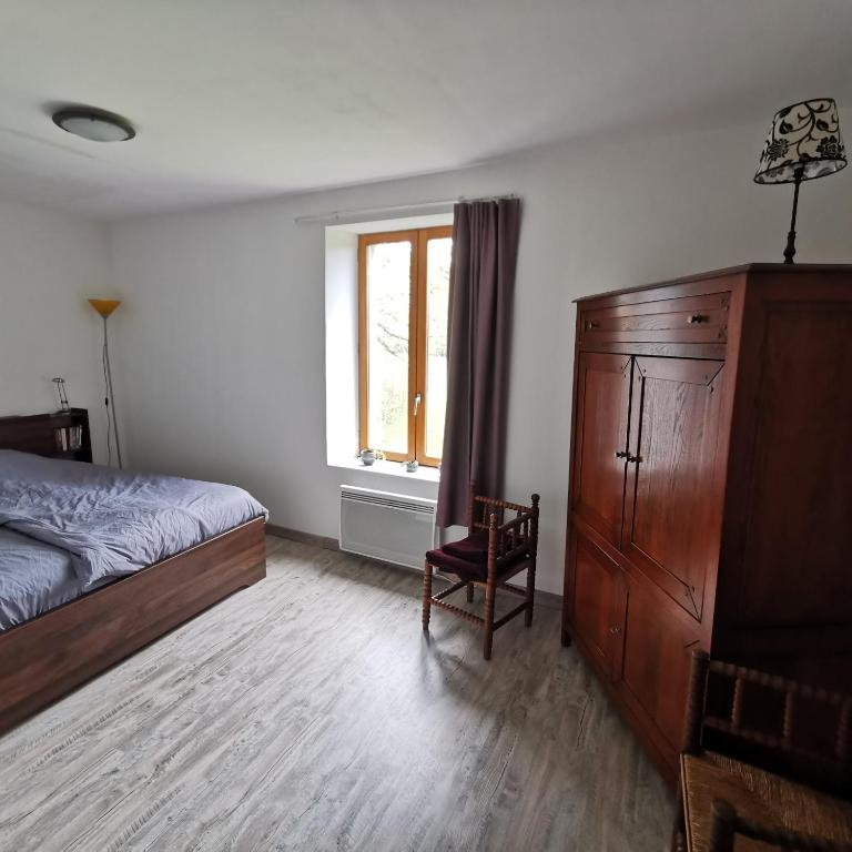 Postel nebo postele na pokoji v ubytování Auberge du Précontent