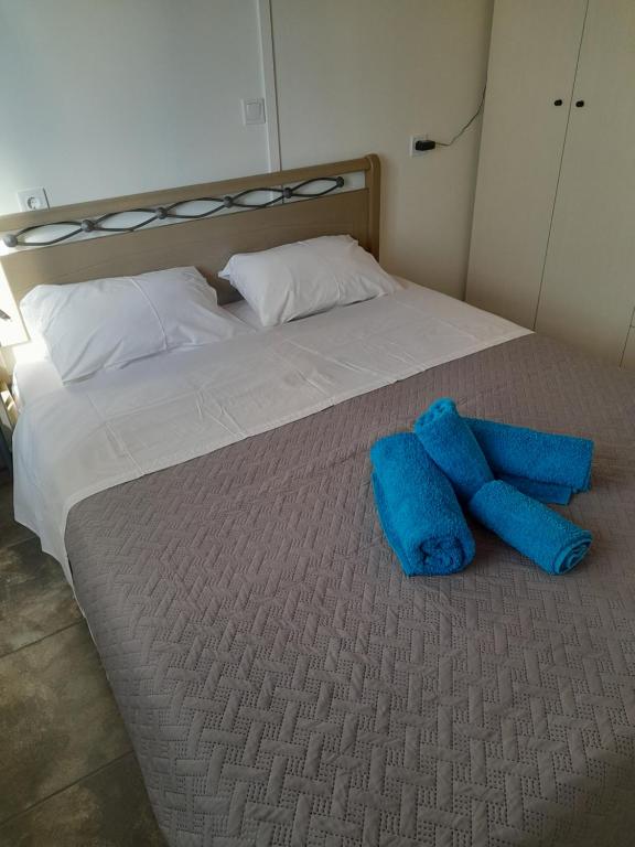 Postel nebo postele na pokoji v ubytování Cosmitsa House