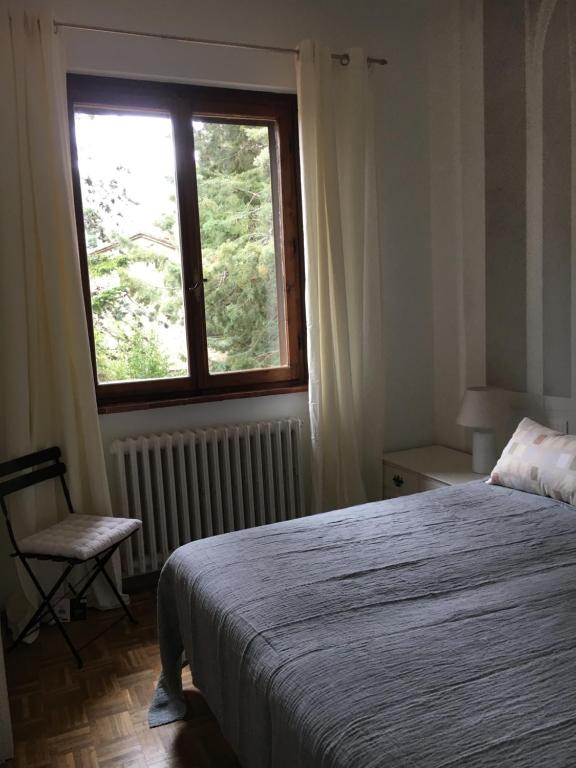 Postel nebo postele na pokoji v ubytování Villamonestevole501