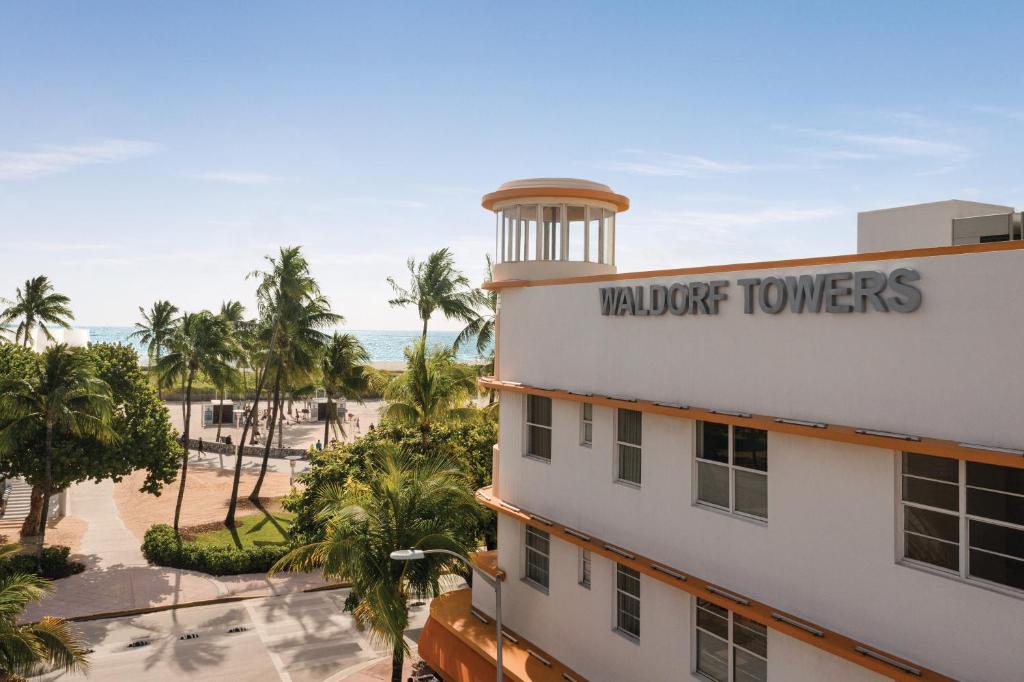 a view of a building with a walker towers sign on it at Waldorf Towers South Beach in Miami Beach