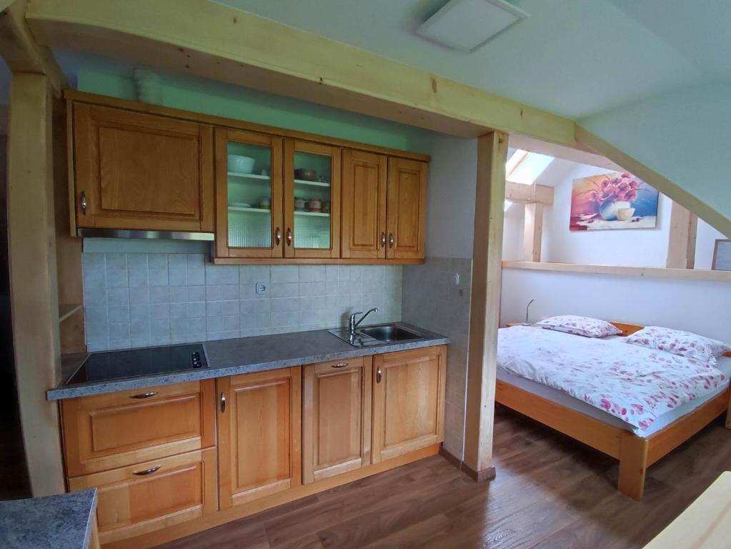 Postel nebo postele na pokoji v ubytování Apartmaji Mojca
