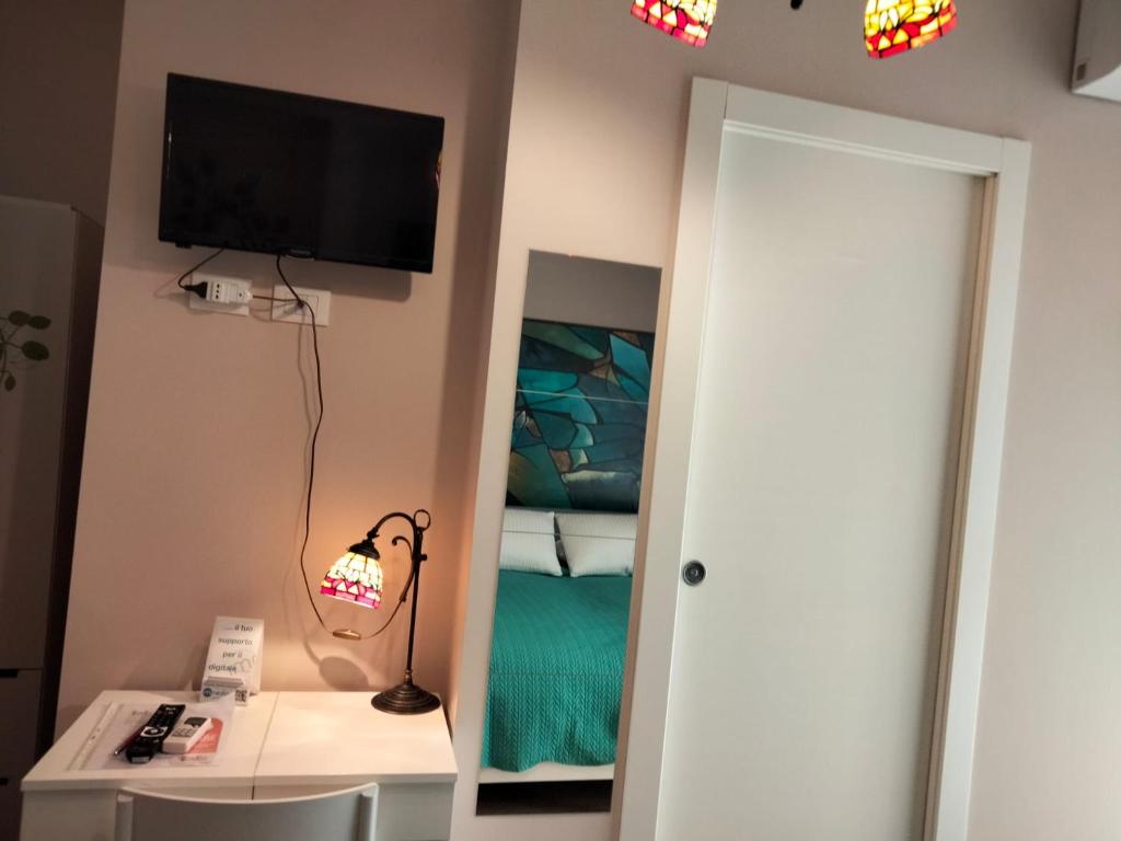 Posteľ alebo postele v izbe v ubytovaní B&b Bagheria