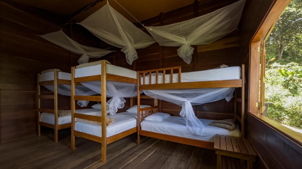 Postel nebo postele na pokoji v ubytování Mano Verde Minca