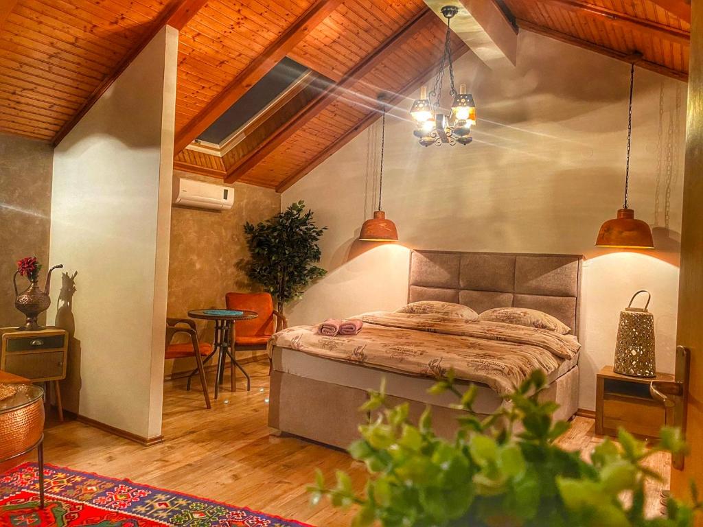 Postel nebo postele na pokoji v ubytování Pansion Bubamara Mostar