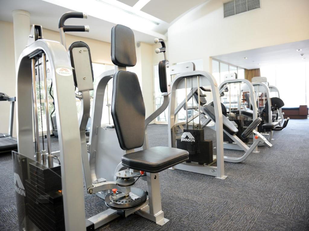 A resistance-training area centered on a seated weight machine.